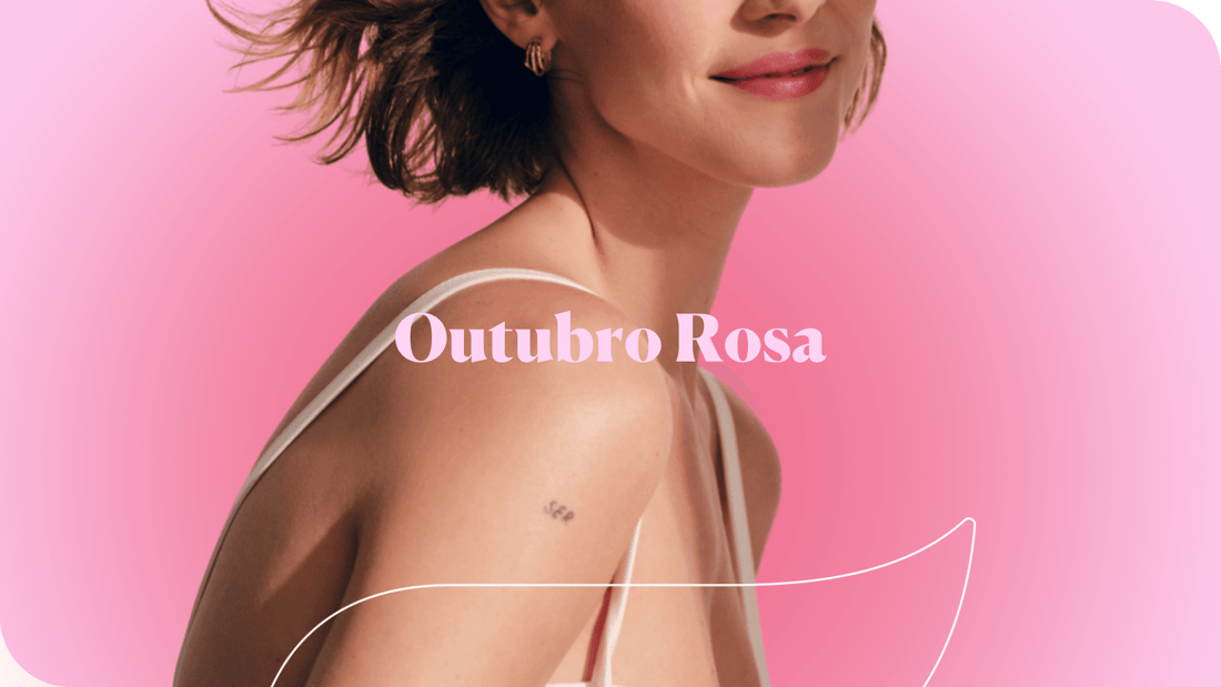 mulher de perfil com a frase "Outubro Rosa" escrita sobre seu ombro